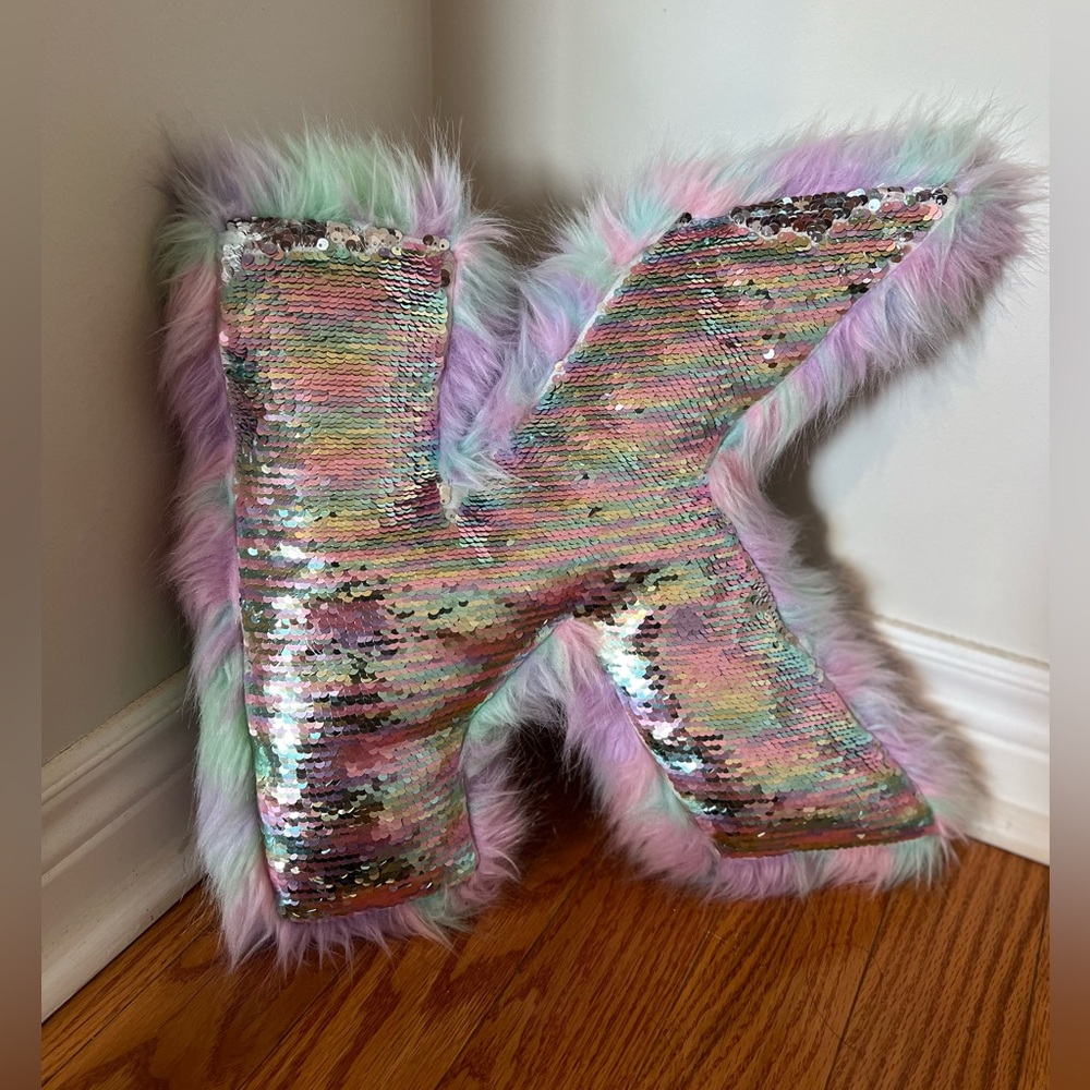 Justice K initial sequin pillow
